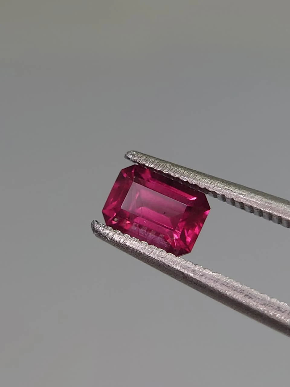 0.8ct Natural Emerald Faceted Umbalite Garnet from Tanzania — view 3